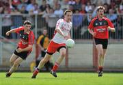 8 June 2008; Colm Cavanagh, Tyrone, in action against Colm Murney, left, and Jack Lynch, Down. GAA Football Ulster Senior Championship Quarter-Final, Tyrone v Down, Healy Park, Omagh, Co. Tyrone. Picture credit: Brian Lawless / SPORTSFILE