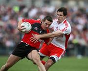 14 June 2008; Ronan Murtagh, Down, in action against Justin McMahon, Tyrone. GAA Football Ulster Senior, Down v Tyrone, Pairc Esler, Newry, Co. Down. Picture credit: Oliver McVeigh / SPORTSFILE