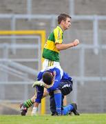 15 June 2008; Niall Fleming, Kerry, celebrates after scoring his side's second goal as Pierce Deloughrey, Clare, lies dejected. Munster Junior Football Championship Semi-Final, Kerry v Clare, Fitzgerald Stadium, Killarney, Co. Kerry. Picture credit: Stephen McCarthy / SPORTSFILE