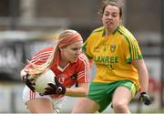 9 May 2015; Lauren McConville, Armagh, in action against Nicole McLaughlin, Donegal. TESCO HomeGrown Ladies National Football League, Division 2 Final, Armagh v Donegal. Parnell Park, Dublin. Picture credit: Cody Glenn / SPORTSFILE
