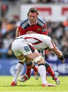 9 May 2015; CJ Stander, Munster, is tackled by Dan Tuohy, Ulster. Guinness PRO12, Round 21, Ulster v Munster. Kingspan Stadium, Ravenhill Park, Belfast. Picture credit: Ramsey Cardy / SPORTSFILE