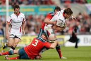9 May 2015; Iain Henderson, Ulster, is tackled by Stephen Archer and Andrew Smith, Munster. Guinness PRO12, Round 21, Ulster v Munster. Kingspan Stadium, Ravenhill Park, Belfast. Picture credit: Oliver McVeigh / SPORTSFILE