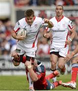 9 May 2015; Louis Ludik, Ulster, is tackled by Felix Jones, Munster. Guinness PRO12, Round 21, Ulster v Munster. Kingspan Stadium, Ravenhill Park, Belfast. Picture credit: Oliver McVeigh / SPORTSFILE