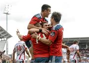 9 May 2015;Keith Earls, Munster, centre, celebrates his late try with teammates Conor Murray, top, Ian Keatley and Andrew Smith, right. Guinness PRO12, Round 21, Ulster v Munster. Kingspan Stadium, Ravenhill Park, Belfast. Picture credit: Oliver McVeigh / SPORTSFILE