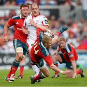 9 May 2015; Keith Earls, Munster, is tackled by Bronson Ross, Ulster. Guinness PRO12, Round 21, Ulster v Munster. Kingspan Stadium, Ravenhill Park, Belfast. Picture credit: Oliver McVeigh / SPORTSFILE