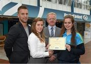 8 May 2015; Eithne Connolly, branch manager, Bank of Ireland DCU, and Michael Kennedy, DCU GAA Academy Director, in the company of Jonny Cooper DCU recruitment officer / ladies football coach, left, present a DCU GAA scholarship awards 2015 to Katie Murray, Clontarf, Dublin. Dublin City University, Glasnevin, Dublin. Picture credit: Ray McManus / SPORTSFILE