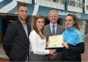 8 May 2015; Eithne Connolly, branch manager, Bank of Ireland DCU, and Michael Kennedy, DCU GAA Academy Director, in the company of Jonny Cooper DCU recruitment officer / ladies football coach, left, present a DCU GAA scholarship awards 2015 to Laura McEnaney, Corduff, Co Monaghan. Dublin City University, Glasnevin, Dublin. Picture credit: Ray McManus / SPORTSFILE
