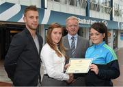 8 May 2015; Eithne Connolly, branch manager, Bank of Ireland DCU, and Michael Kennedy, DCU GAA Academy Director, in the company of Jonny Cooper DCU recruitment officer / ladies football coach, left, present a DCU GAA scholarship awards 2015 to Sinéad Greene, Templeport, Co Cavan. Dublin City University, Glasnevin, Dublin. Picture credit: Ray McManus / SPORTSFILE