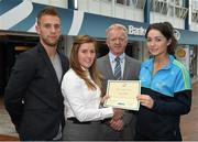8 May 2015; Eithne Connolly, branch manager, Bank of Ireland DCU, and Michael Kennedy, DCU GAA Academy Director, in the company of Jonny Cooper DCU recruitment officer / ladies football coach, left, present a DCU GAA scholarship awards 2015 to Leah Mullins, St Brigid's, Dublin. Dublin City University, Glasnevin, Dublin. Picture credit: Ray McManus / SPORTSFILE