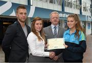 8 May 2015; Eithne Connolly, branch manager, Bank of Ireland DCU, and Michael Kennedy, DCU GAA Academy Director, in the company of Jonny Cooper DCU recruitment officer / ladies football coach, left, present a DCU GAA scholarship awards 2015 to Sarah Rowe, Kilmoremoy, Ballina, Co Mayo. Dublin City University, Glasnevin, Dublin. Picture credit: Ray McManus / SPORTSFILE