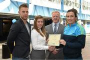8 May 2015; Eithne Connolly, branch manager, Bank of Ireland DCU, and Michael Kennedy, DCU GAA Academy Director, in the company of Jonny Cooper DCU recruitment officer / ladies football coach, left, present a DCU GAA scholarship awards 2015 to Bríd O'Sullivan, Mourneabbey, Co Cork. Dublin City University, Glasnevin, Dublin. Picture credit: Ray McManus / SPORTSFILE