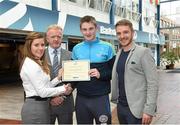 8 May 2015; Eithne Connolly, branch manager, Bank of Ireland DCU, and Michael Kennedy, DCU GAA Academy Director, in the company of Ross Munnelly, Fresher A football manager, right, presents a DCU GAA scholarship awards 2015 to Desmond Reynolds, Sean Connollys GAA, Longford. Dublin City University, Glasnevin, Dublin. Picture credit: Ray McManus / SPORTSFILE