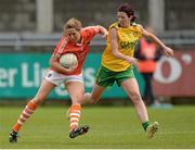 9 May 2015; Armagh's Caroline O'Hanlon, in action against Aoife McDonnell, Donegal. TESCO HomeGrown Ladies National Football League, Division 2 Final, Armagh v Donegal. Parnell Park, Dublin. Picture credit: Piaras Ó Mídheach / SPORTSFILE