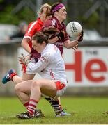 9 May 2015; Annette Clarke, Galway, is fouled for a penalty by Cork goalkeeper Martina O'Brien. TESCO HomeGrown Ladies National Football League, Division 1 Final, Cork v Galway. Parnell Park, Dublin. Picture credit: Piaras Ó Mídheach / SPORTSFILE