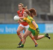 9 May 2015; Shannon McGroddy, Donegal, in action against Caroline O'Hanlon, Armagh. TESCO HomeGrown Ladies National Football League, Division 2 Final, Armagh v Donegal. Parnell Park, Dublin. Picture credit: Cody Glenn / SPORTSFILE