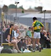 15 June 2008; Paul Galvin, Kerry, makes his way into the dugout after being sent off by referee Paddy Russell. GAA Football Munster Senior Championship Semi-Final, Kerry v Clare, Fitzgerald Stadium, Killarney, Co. Kerry. Picture credit: Stephen McCarthy / SPORTSFILE