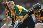 15 June 2008; The Offaly captain and goalkeeper Brian Mullins prepares to clear under pressure from Kilkenny forwards Eoin larkin, left, and Richie Hogan. GAA Hurling Leinster Senior Championship Semi-Final, Offaly v Kilkenny, O'Moore Park, Portlaoise, Co. Laois. Picture credit: Ray McManus / SPORTSFILE