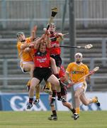 15 June 2008; Down pair Kieran Courtney and Liam Clarke contest a dropping ball with Antrim's Paul Shiels. GAA Hurling Ulster Senior Championship Final, Antrim v Down, Casement Park, Belfast. Picture credit: Damien Eagers / SPORTSFILE