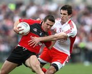 14 June 2008; Ronan Murtagh, Down in action against Justin McMahon, Tyrone. GAA Football Ulster Senior, Down v Tyrone, Pairc Esler, Newry, Co. Down. Picture credit: Oliver McVeigh / SPORTSFILE