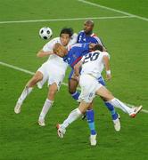 17 June 2008; Luca Toni, left, and Simone Perrotta, Italy, in action against William Gallas, left, and Jean-Alain Boumsong, France. UEFA EURO 2008TM, France v Italy, Letzigrund Stadion, Zurich, Switzerland. Picture credit; Paul Mohan / SPORTSFILE