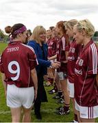 9 May 2015; Maire Hickey, President of Ladies Gaelic Football Association, is introduced to the Galway team by captain Geraldine Conneally. TESCO HomeGrown Ladies National Football League, Division 1 Final, Cork v Galway. Parnell Park, Dublin. Picture credit: Piaras Ó Mídheach / SPORTSFILE