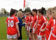9 May 2015; Maire Hickey, President of Ladies Gaelic Football Association, is introduced to the Cork team by captain Ciara O'Sullivan. TESCO HomeGrown Ladies National Football League, Division 1 Final, Cork v Galway. Parnell Park, Dublin. Picture credit: Piaras Ó Mídheach / SPORTSFILE
