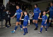 8 May 2015; Leinster matchday mascot Jack Finnegan with Leinster's Jimmy Gopperth and Jack Livingstone with Leinster's Mike Ross ahead of the Guinness PRO12, Round 21, match between Leinster and Benetton Treviso at the RDS, Ballsbridge, Dublin. Picture credit: Stephen McCarthy / SPORTSFILE