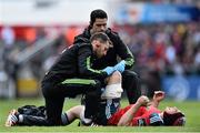 9 May 2015; Munster's Tommy O'Donnell is treated for an injury during the first half. Guinness PRO12, Round 21, Ulster v Munster. Kingspan Stadium, Ravenhill Park, Belfast. Picture credit: Ramsey Cardy / SPORTSFILE
