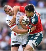 9 May 2015; Conor Murray, Munster, is tackled by Ruan Pienaar, Ulster. Guinness PRO12, Round 21, Ulster v Munster. Kingspan Stadium, Ravenhill Park, Belfast. Picture credit: Ramsey Cardy / SPORTSFILE