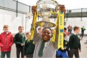 11 May 2015; Kelvin Williams, aged 9, a student at St. Laurence O'Toole NS lifts the FAI Junior Cup during the FAI Jnr Cup Tour and Community Day. Picture credit: Cody Glenn / SPORTSFILE