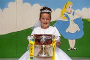 11 May 2015; Holly Kelly, aged 8, from City Quay NS, Gloucester Street South, Dublin, with the FAI Junior Cup during the FAI Junior Cup Tour and Community Day where former Republic of Ireland International Kevin Kilbane surprised two supporters with VIP tickets to the FAI Junior Cup Final at the Aviva Stadium on Sunday. City Quay NS, Gloucester Street South, Dublin. Picture credit: Piaras Ó Mídheach / SPORTSFILE