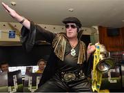 11 May 2015; Michael 'Elvis' Heapes, from Ringsend, dances with the FAI Junior Cup for a crowd in The Padraig Pearse pub after former Republic of Ireland International Kevin Kilbane surprised former Liffey Wanderers' player and manager Parko Kealy with VIP tickets to the FAI Junior Cup Final at the Aviva Stadium on Sunday during the FAI Junior Cup Tour and Community Day. The Padraig Pearse, Pearse Street, Dublin. Picture credit: Cody Glenn / SPORTSFILE