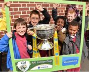 11 May 2015; St. Laurence O'Toole N.S. students, from left to right, Calvin Byrne, Arthur Cholojenko, Sean Daluz, Mikey McInerney and Joel Elugu, all aged 8, hold up the FAI Junior Cup during the FAI Jnr Cup Tour and Community Day. St. Laurence O'Toole N.S., Dublin. Picture credit: Cody Glenn / SPORTSFILE