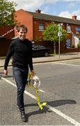11 May 2015; Former Republic of Ireland International Kevin Kilbane makes his way to The Padraig Pearse to surprise former Liffey Wanderers' player and manager Parko Kealy with VIP tickets to the FAI Junior Cup Final at the Aviva Stadium on Sunday during the FAI Junior Cup Tour and Community Day. The Padraig Pearse, Pearse Street, Dublin. Picture credit: Piaras Ó Mídheach / SPORTSFILE