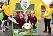 11 May 2015; St. Laurence O'Toole G.N.S. students, from left in frame, Heidi Butler, Dani Downey, Libby Gannon and Ellie Byrne show their support for Sheriff YC during the FAI Jnr Cup Tour and Community Day with the FAI flag held by Aviva employees Peter Vincent, left, a motor underwriter, and Breda Judge, volunteer coordinator. St. Laurence O'Toole NS. Dublin. Picture credit: Cody Glenn / SPORTSFILE