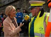 11 May 2015; Sheriff YC legend Noel Kelligher, and lollipop man at St Laurence O'Toole's NS on Seville Place in inner city, is interviewed by Ger Treacy after he was surprised by former Republic of Ireland International Kevin Kilbane with VIP tickets to the FAI Junior Cup Final at the Aviva Stadium on Sunday during the FAI Junior Cup Tour and Community Day. Seville Place, Dublin. Picture credit: Piaras Ó Mídheach / SPORTSFILE