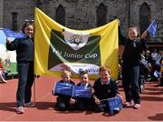 11 May 2015; Students Kasey Radu, 12, left, and Kirsten Whelan, 12, hold up an FAI Junior Cup flag above Alfie Anderson, 10, Ashton Caffrey, 11, and Josh McDonald, 12, at City Quay N.S. during the FAI Junior Cup Tour and Community Day. City Quay N.S. Gloucester Street South, Dublin. Picture credit: Cody Glenn / SPORTSFILE