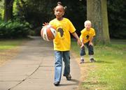 17 June 2008; At the launch of the Athletics Advocate for Africa conference, to be hosted by Special Olympics Ireland from 22-26 June in Dublin are seven-year-old Blessing Nduka, from Clonee, Co. Meath, and Special Olympics Athlete Andrew McCarthy, from Foxrock, Dublin. St. Stephen’s Green, Dublin. Picture credit: David Maher / SPORTSFILE