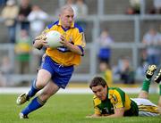 15 June 2008; Brian Carrig, Clare, in action against Kieran Quirke, Kerry. Munster Junior Football Championship Semi-Final, Kerry v Clare, Fitzgerald Stadium, Killarney, Co. Kerry. Picture credit: Stephen McCarthy / SPORTSFILE