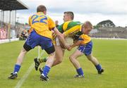 15 June 2008; Paddy Curran, Kerry, in action against Conor O'Brien, left, and Marty McMahon, Clare. Munster Junior Football Championship Semi-Final, Kerry v Clare, Fitzgerald Stadium, Killarney, Co. Kerry. Picture credit: Stephen McCarthy / SPORTSFILE
