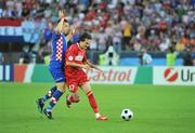 20 June 2008; Tuncay Sanli, Turkey, in action against Ivica Olic, Croatia. UEFA EURO 2008TM, Quarter-Final, Croatia v Turkey, Ernst Happel Stadion, Vienna, Austria. Picture credit; Pat Murphy / SPORTSFILE