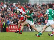 21 June 2008; Niall McCusker, Derry, in action against Martin McGrath, Fermanagh. Ulster GAA Senior Football Championship Semi Final, Derry v Fermanagh, Healy Park, Omagh, Co. Tyrone. Picture credit: Oliver McVeigh / SPORTSFILE