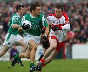 21 June 2008; Ryan McCluskey, Fermanagh, in action against Barry McGoldrick, Derry. Ulster GAA Senior Football Championship Semi Final, Derry v Fermanagh, Healy Park, Omagh, Co. Tyrone. Picture credit: Oliver McVeigh / SPORTSFILE