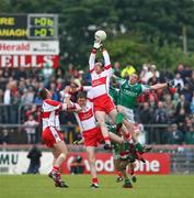 21 June 2008; Enda Muldoon, Derry, in action against Mark Murphy, Fermanagh. Ulster GAA Senior Football Championship Semi Final, Derry v Fermanagh, Healy Park, Omagh, Co. Tyrone. Picture credit: Oliver McVeigh / SPORTSFILE