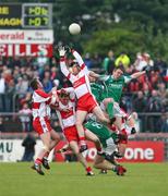 21 June 2008; Mark Murphy, Fermanagh, in action against Enda Muldoon, Derry. Ulster GAA Senior Football Championship Semi Final, Derry v Fermanagh, Healy Park, Omagh, Co. Tyrone. Picture credit: Oliver McVeigh / SPORTSFILE