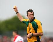 21 June 2008; Referee Syl Doyle issues a yellow card. Ulster GAA Senior Football Championship Semi Final, Derry v Fermanagh, Healy Park, Omagh, Co. Tyrone. Picture credit: Oliver McVeigh / SPORTSFILE