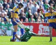 22 June 2008; Tony Carmody, Clare, kicks out at Seamus Hickey, Limerick, for which he was shown a yellow card by referee Eamonn Morris. GAA Hurling Munster Senior Championship Semi-Final, Limerick v Clare, Semple Stadium, Thurles, Co. Tipperary. Picture credit: Brendan Moran / SPORTSFILE