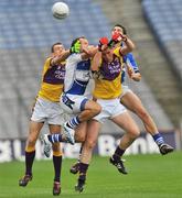 22 June 2008; Thomas Howlin and Adrian Flynn, left, Wexford, in action against Tom Kelly and Brendan Quigley, right, Laois. GAA Football Leinster Senior Championship Semi-Final, Laois v Wexford, Croke Park, Dublin. Picture credit: Brian Lawless / SPORTSFILE
