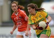 9 May 2015; Ciara Hegarty, Donegal, in action against Caroline O'Hanlon, Armagh. TESCO HomeGrown Ladies National Football League, Division 2 Final, Armagh v Donegal. Parnell Park, Dublin. Picture credit: Piaras Ó Mídheach / SPORTSFILE