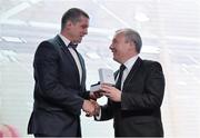 13 May 2015; Former Munster and Ireland legend Alan Quinlan is presented with the Zurich Contribution to Society award, in recognition of the significant impact made to society through his work raising the profile of mental health and depression in Ireland, by Conor Brennan, right, CEO, Zurich Ireland, at the Hibernia College IRUPA Rugby Player Awards 2015. Burlington Hotel, Dublin. Picture credit: Brendan Moran / SPORTSFILE